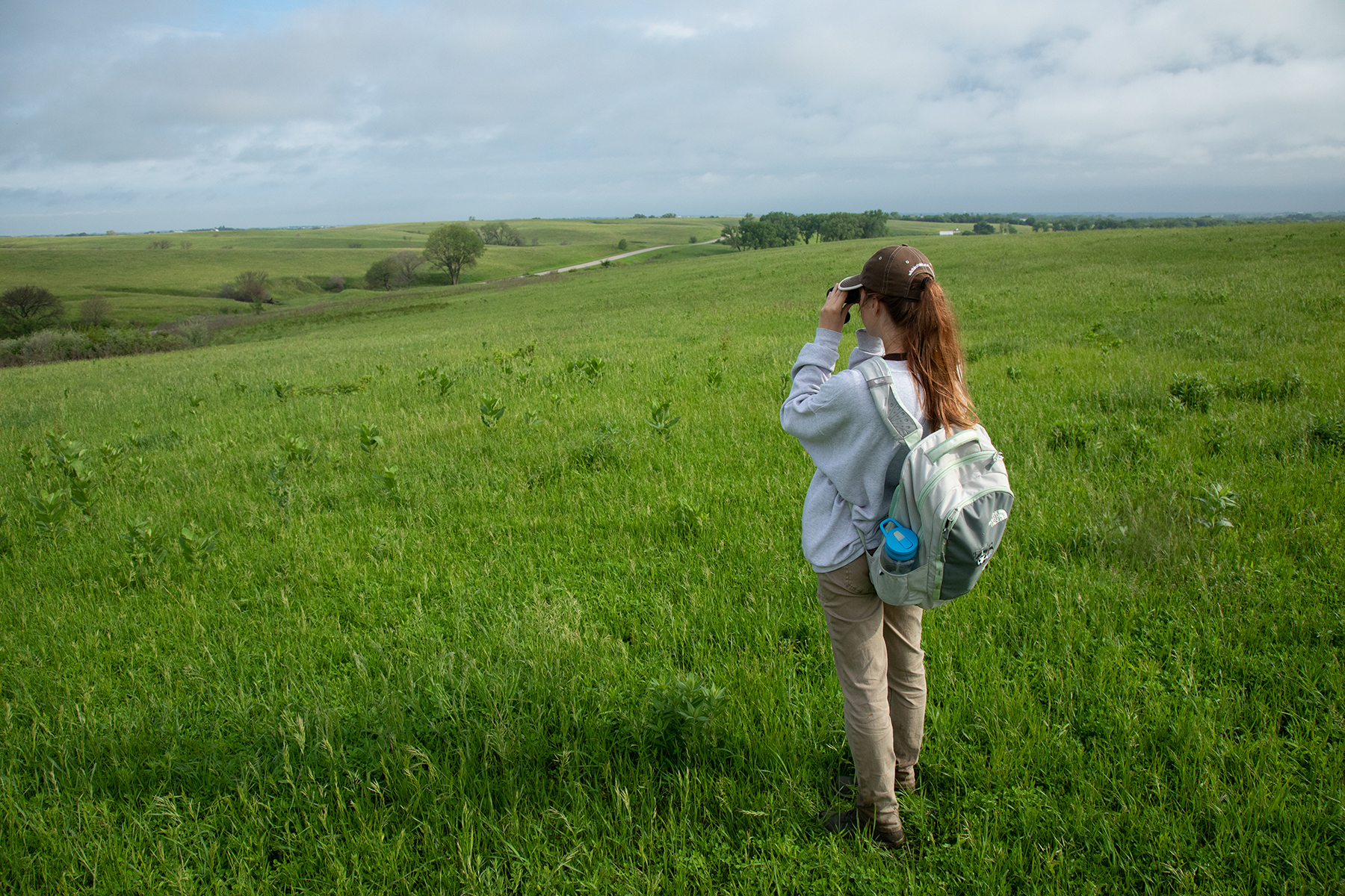 photo of student looking across prairie